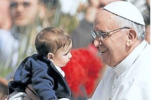 Pope Francis Reaches for a Little Boy
