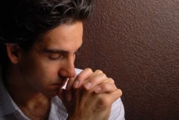 Sad Man in Prayer