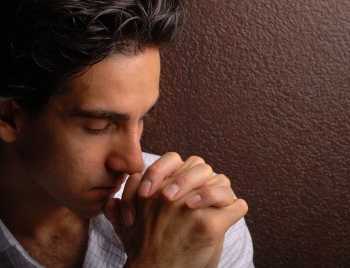 Sad Man in Prayer